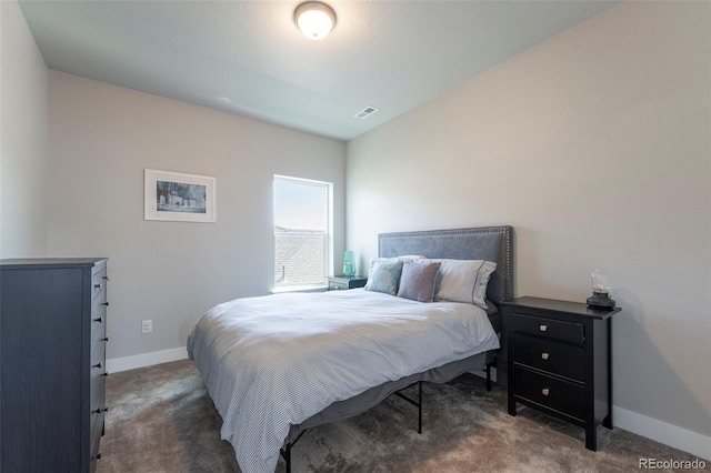 21574 E 59th Dr, Aurora, CO 80019 - carpeted bedroom with baseboards