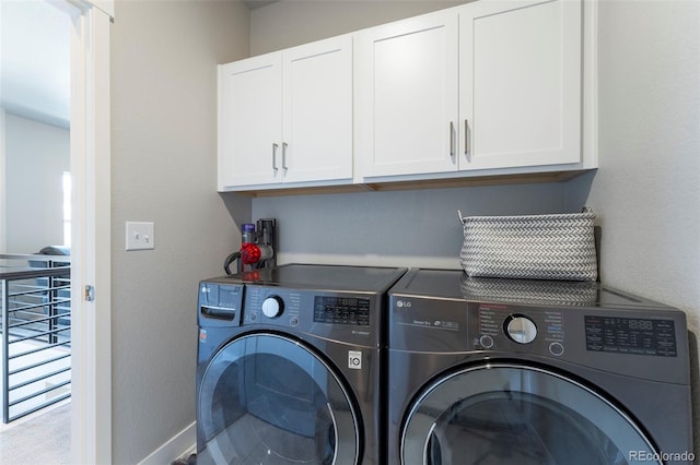 21574 E 59th Dr, Aurora, CO 80019 - clothes washing area featuring cabinet space and washing machine and dryer