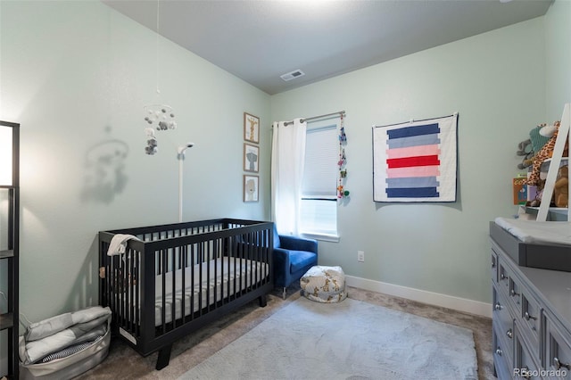 21574 E 59th Dr, Aurora, CO 80019 - bedroom with baseboards and a nursery area