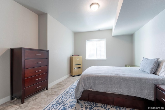 21574 E 59th Dr, Aurora, CO 80019 - bedroom featuring light colored carpet and baseboards