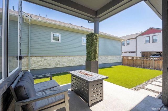 21574 E 59th Dr, Aurora, CO 80019 - view of patio with a fire pit