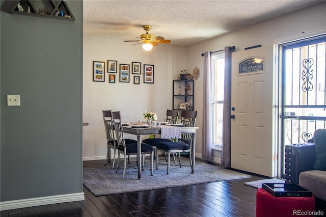 19930 E Cornell Ave, Aurora, CO 80013 - dining room featuring wood finished floors, a textured ceiling, a ceiling fan, baseboards, and a textured wall
