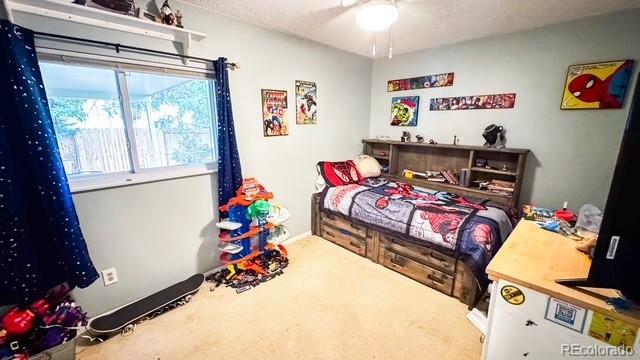 19930 E Cornell Ave, Aurora, CO 80013 - bedroom featuring carpet floors and ceiling fan