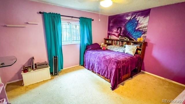 19930 E Cornell Ave, Aurora, CO 80013 - carpeted bedroom featuring a ceiling fan and baseboards