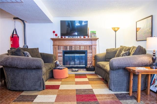 19930 E Cornell Ave, Aurora, CO 80013 - living area featuring a textured ceiling and a brick fireplace