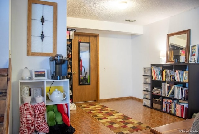 19930 E Cornell Ave, Aurora, CO 80013 - interior space with a textured ceiling and tile patterned floors