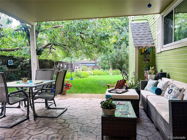19930 E Cornell Ave, Aurora, CO 80013 - fenced backyard with an outdoor living space, a patio area, and outdoor dining area