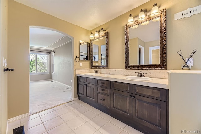 2950 Wyecliff Ln, Highlands Ranch, CO 80126 - bathroom with double vanity, baseboards, and tile patterned flooring