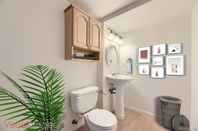 2950 Wyecliff Ln, Highlands Ranch, CO 80126 - bathroom featuring baseboards and wood finished floors