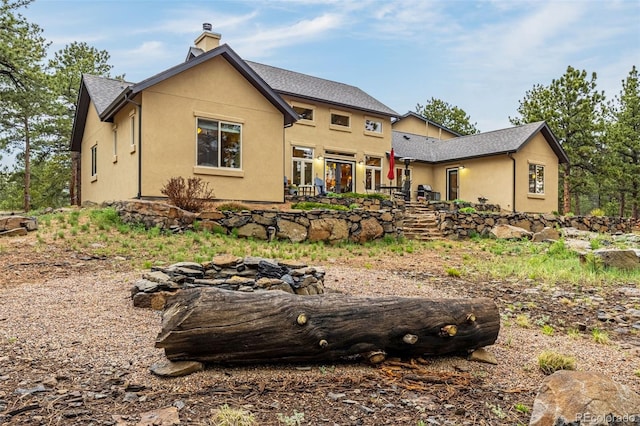 459 County Road 85, Guffey, CO 80820 - view of front of property featuring stucco siding and a chimney