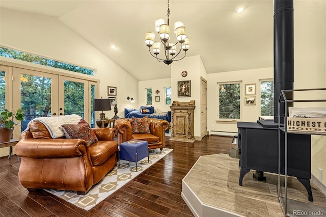 459 County Road 85, Guffey, CO 80820 - living room featuring french doors, high vaulted ceiling, a chandelier, healthy amount of natural light, and a baseboard radiator