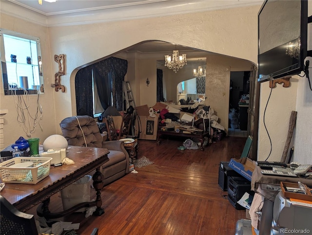 1415 Raleigh St, Denver, CO 80204 - living area featuring a chandelier, arched walkways, wood-type flooring, crown molding, and a textured wall