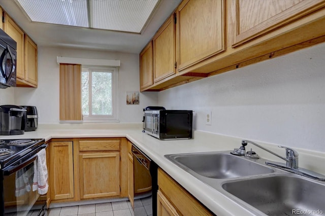 11115 E Alameda Ave Unit 201, Aurora, CO 80012 - kitchen with a sink, light tile patterned floors, black appliances, and light countertops