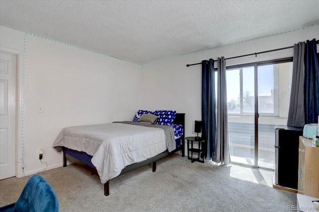 11115 E Alameda Ave Unit 201, Aurora, CO 80012 - bedroom with baseboards, carpet flooring, and a textured ceiling