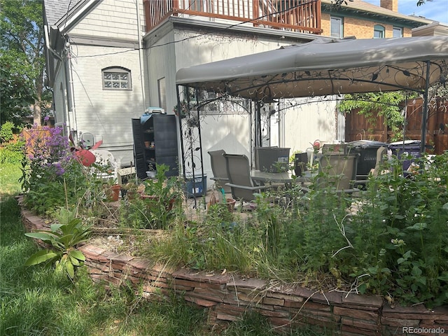 36 N Logan St, Denver, CO 80203 - rear view of house featuring a gazebo and brick siding