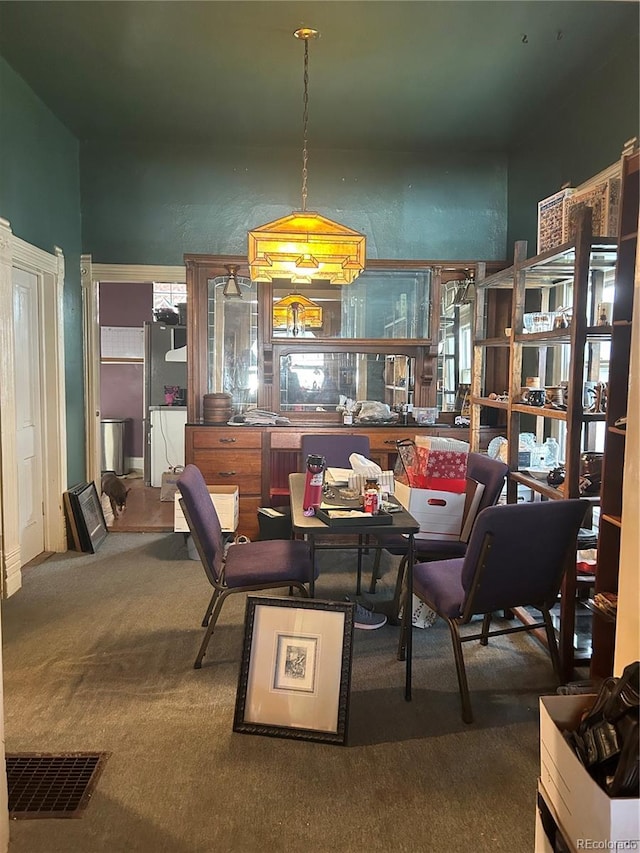36 N Logan St, Denver, CO 80203 - dining space with carpet floors