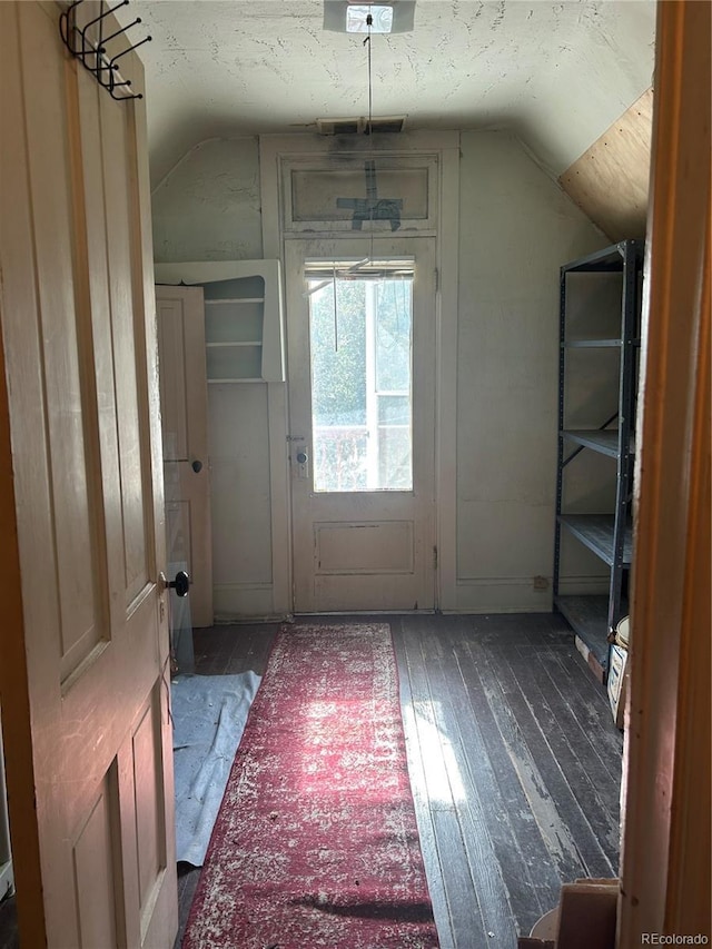 36 N Logan St, Denver, CO 80203 - bonus room featuring vaulted ceiling and hardwood / wood-style floors