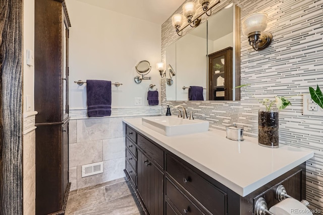 6646 S Fundy Ct, Centennial, CO 80016 - bathroom with tile walls and vanity
