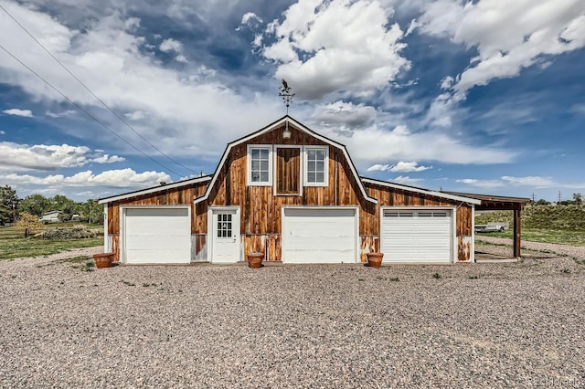 6646 S Fundy Ct, Centennial, CO 80016 - view of front of property with a detached garage, an outbuilding, and a barn