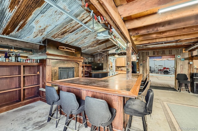 6646 S Fundy Ct, Centennial, CO 80016 - bar area featuring concrete floors and a fireplace