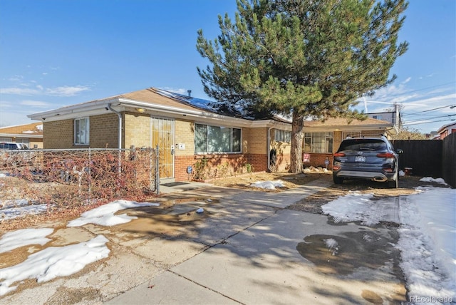 ranch-style house with a carport