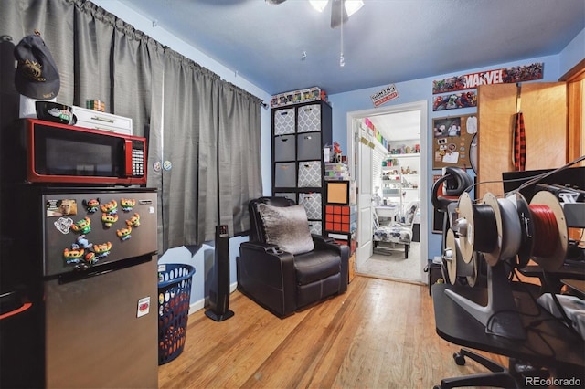 office area featuring hardwood / wood-style floors and ceiling fan