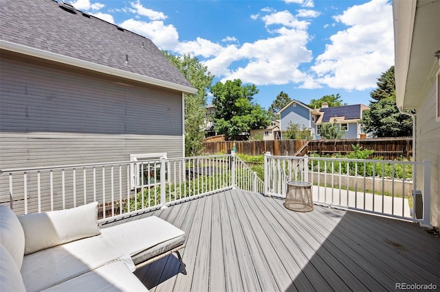 4786 S Yampa St, Aurora, CO 80015 - wooden deck featuring a fenced backyard and a residential view