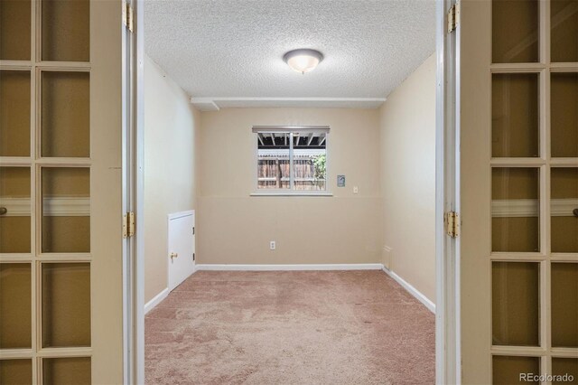 4786 S Yampa St, Aurora, CO 80015 - unfurnished room featuring carpet floors and a textured ceiling