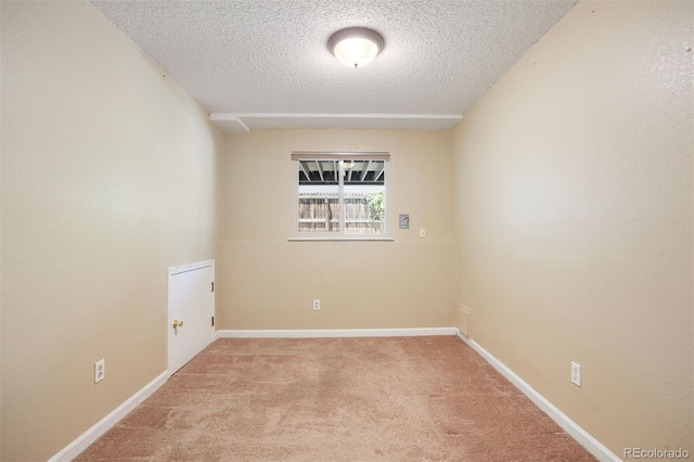 4786 S Yampa St, Aurora, CO 80015 - carpeted empty room with a textured ceiling and baseboards