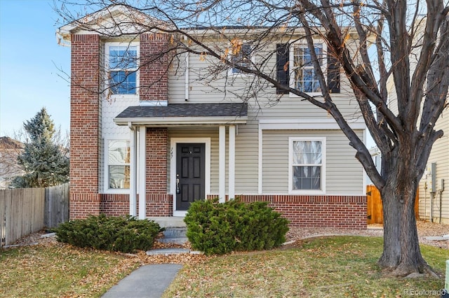 view of front of home with a front yard