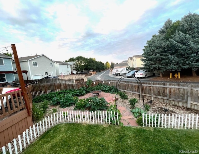 view of yard with a patio area and a fire pit