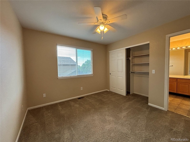 10027 Sylvestor Rd, Highlands Ranch, CO 80129 - unfurnished bedroom featuring carpet, a closet, ensuite bathroom, and a ceiling fan