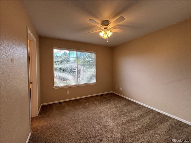 10027 Sylvestor Rd, Highlands Ranch, CO 80129 - empty room featuring dark carpet and ceiling fan