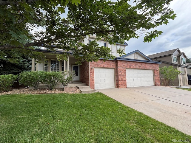 10027 Sylvestor Rd, Highlands Ranch, CO 80129 - view of front of home with a front lawn, driveway, a garage, and brick siding