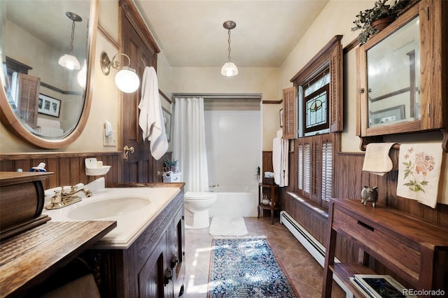 715 Main St, Georgetown, CO 80444 - bathroom with a baseboard heating unit, a wainscoted wall, vanity, shower / bath combo with shower curtain, and wood walls