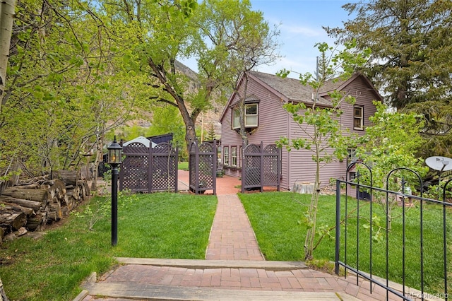 715 Main St, Georgetown, CO 80444 - view of front of home with a front lawn