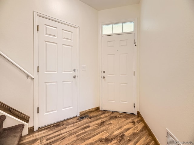 12265 E 2nd Dr, Aurora, CO 80011 - foyer featuring wood finished floors and stairs