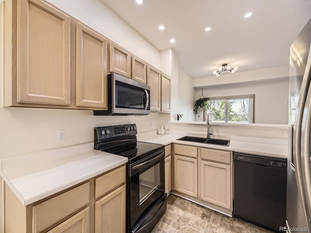 12265 E 2nd Dr, Aurora, CO 80011 - kitchen featuring black appliances, light brown cabinets, recessed lighting, and light countertops