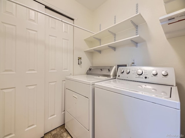 12265 E 2nd Dr, Aurora, CO 80011 - washroom featuring washing machine and dryer