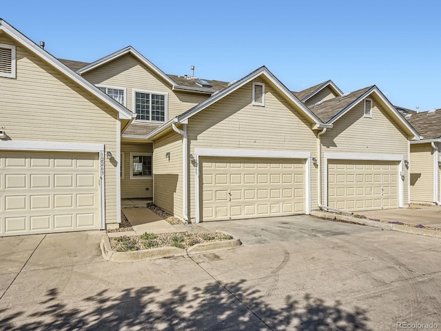 12265 E 2nd Dr, Aurora, CO 80011 - traditional-style home with driveway