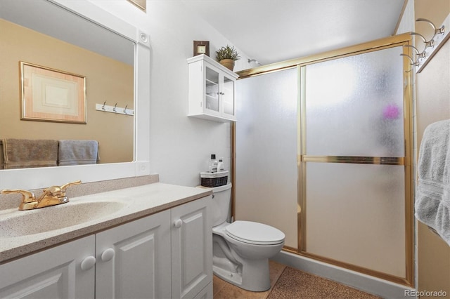 full bath with toilet, a shower stall, and vanity