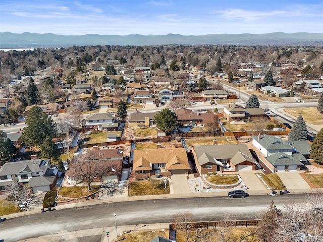 drone / aerial view with a residential view and a mountain view