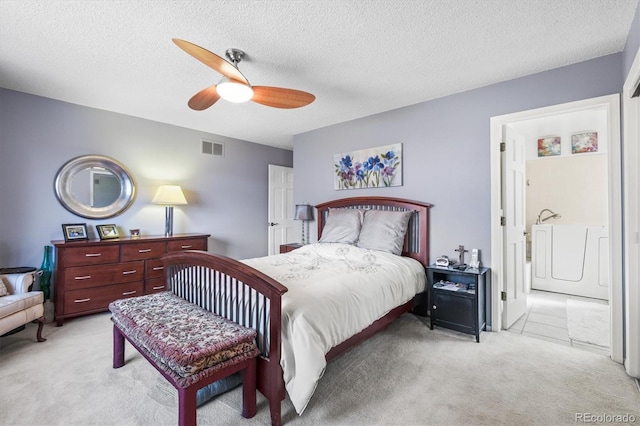4621 S Perry Way, Denver, CO 80236 - bedroom featuring light colored carpet, a ceiling fan, and a textured ceiling
