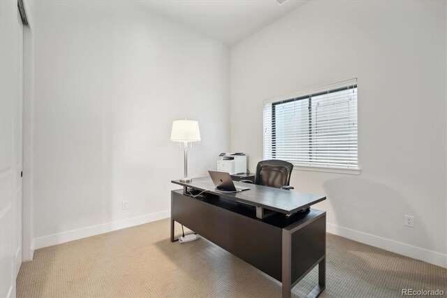 home office featuring light colored carpet