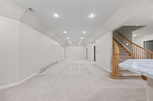 interior space with recessed lighting, visible vents, light colored carpet, stairway, and a baseboard heating unit