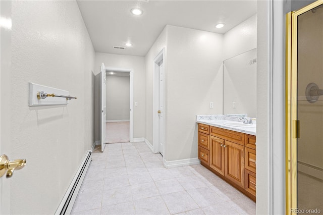 full bathroom with recessed lighting, a baseboard heating unit, vanity, baseboards, and an enclosed shower