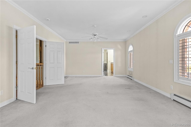 empty room featuring light carpet, a baseboard radiator, visible vents, and crown molding