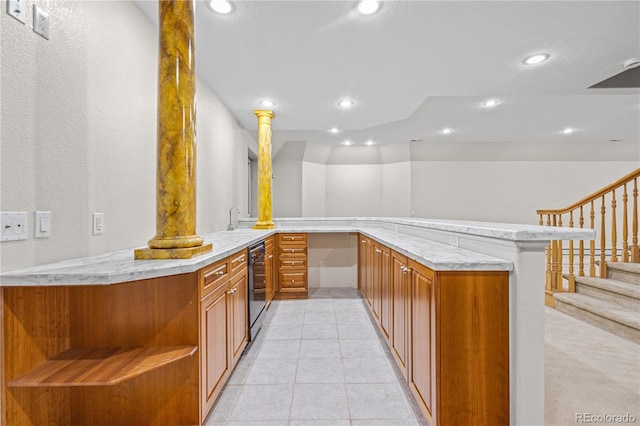 bar with decorative columns, light tile patterned floors, recessed lighting, stairway, and a sink