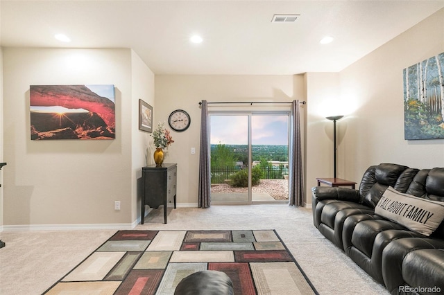 living room featuring light colored carpet