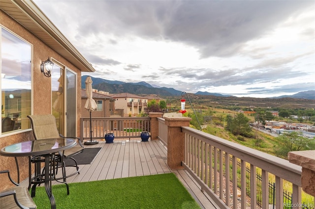 wooden terrace featuring a mountain view